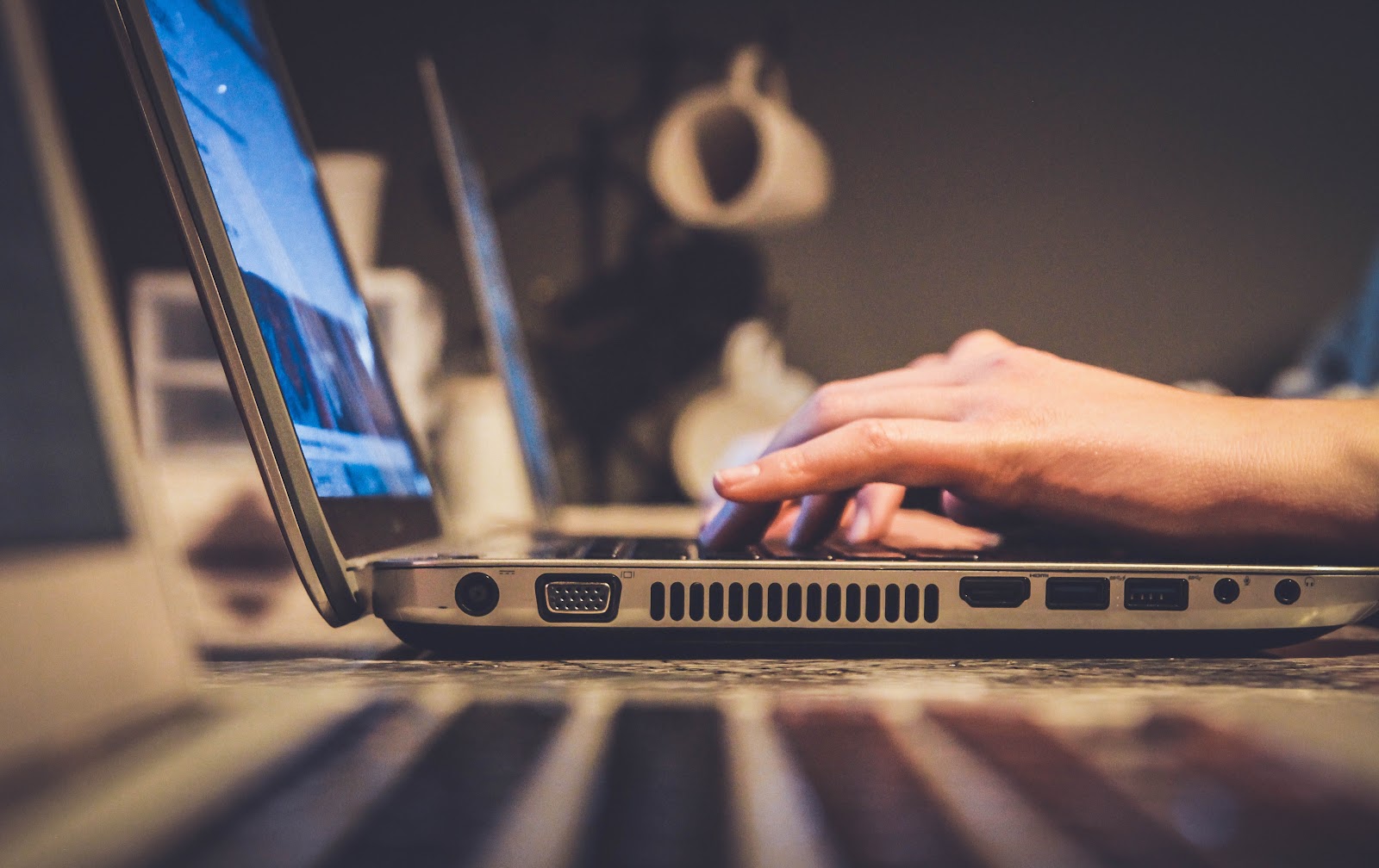 6 Best Payment Processing Softwares for Your Law Firm Website 2 A person typing on a laptop